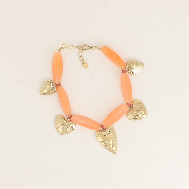 Bracelet sur câble - perles en résine, coeurs aux motifs fleurs gravées