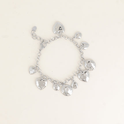 Bracelet - pastilles rondes martelées et coeurs
