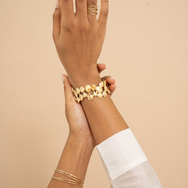 Cuff - openwork teardrop shapes