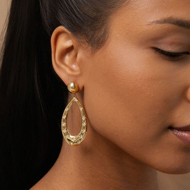 Drop earrings - openwork teardrop, engraved stars and cubic zirconia