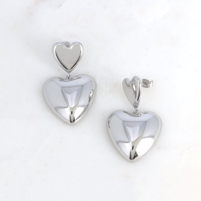 Boucles pendantes - double coeur, un plat et un bombé