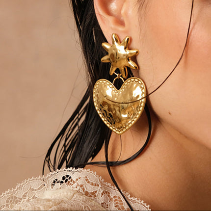 Boucles pendantes Selmya - soleil et coeur martelé