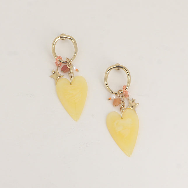 Boucles pendantes - anneau ovale et breloques (coeur, étoiles et résine)