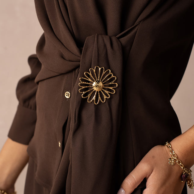 Pin's Icolia - motif marguerite ajouré