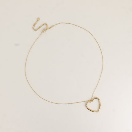Collier - pendentif coeur ajouré et torsadé