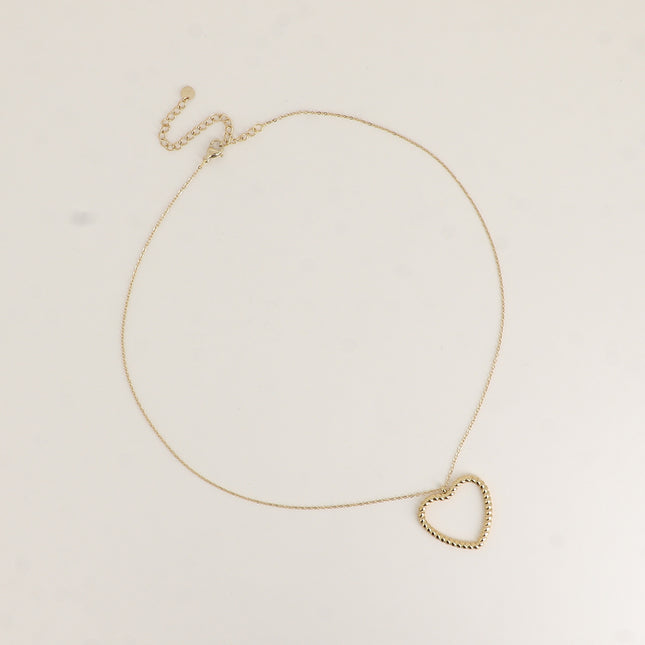 Collier - pendentif coeur ajouré et torsadé