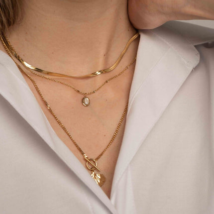 Sierra 3-strand necklace - ring and bar motif, ginkgo leaf and oval natural stone