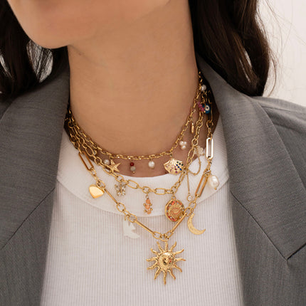 Collier Taliya - breloques (oeil et oxydes de zirconium, fleur nacrée, émail, papillon, pierres naturelles)