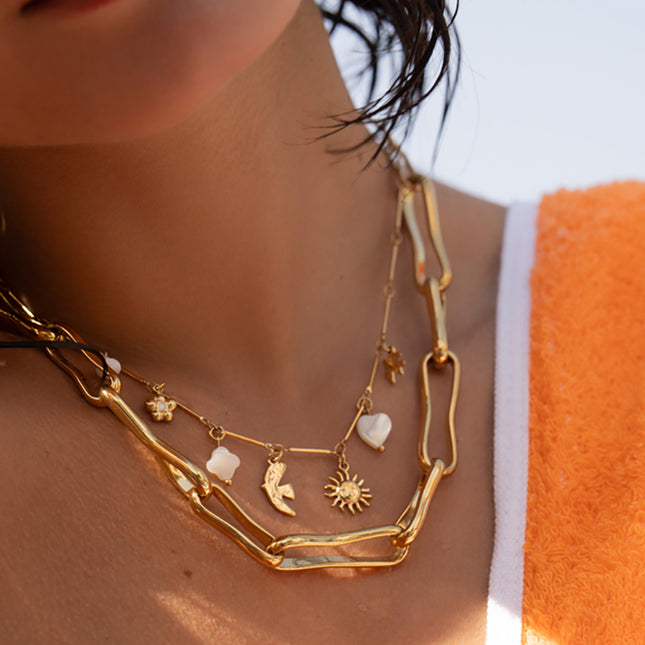 Meliora Necklace - mother-of-pearl sun, bird, clover and heart, flower