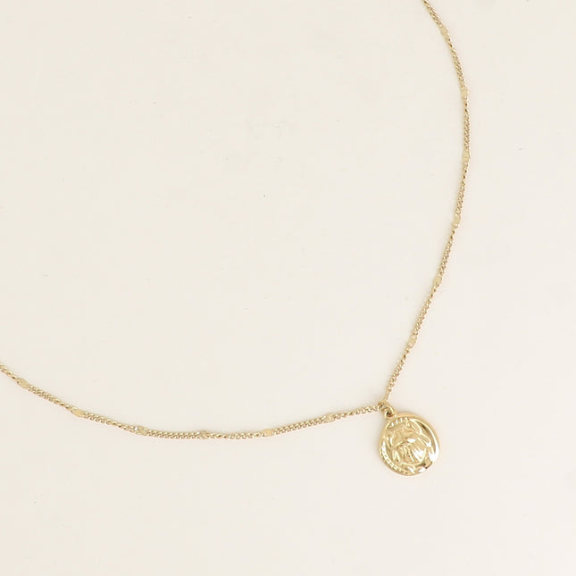 Collier - pendentif rond avec scarabée