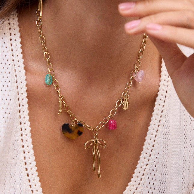 Necklace - hearts, boot, bow tie, beetle, resin elephant