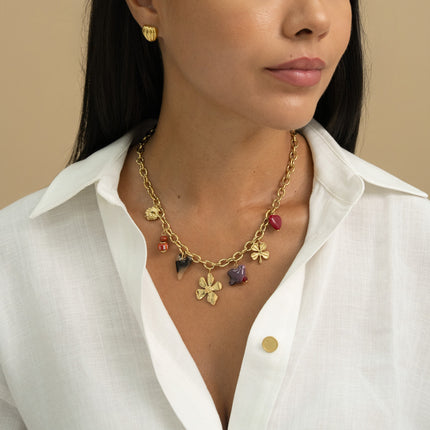 Necklace - ceramic beads and bird, clover, leopard resin heart and flower