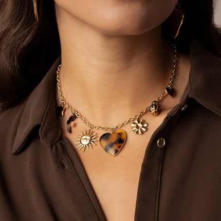 Collier Lior - pendentifs (étoile, soleil, oiseau en résine, coeur en émail, fleur, perles, coeur)