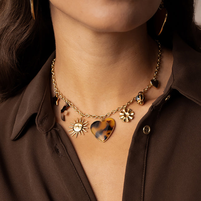 Lior Necklace - pendants (star, sun, resin bird, enamel heart, flower, beads, heart)