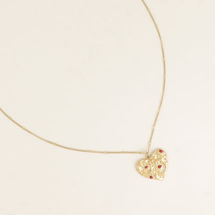 Collier - pendentif coeur avec yeux gravés et émaillés