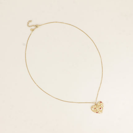 Collier - pendentif coeur avec yeux gravés et émaillés