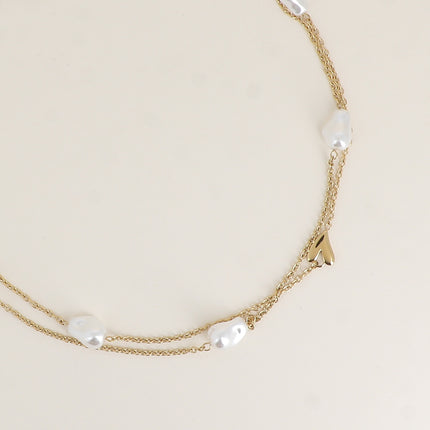 Sautoir - pendentifs coeurs et perles de résine
