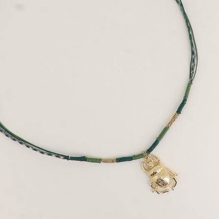 Collier sur cordon - pendentif scarabée