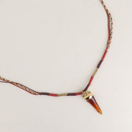 Collier sur cordon - pendentif corne ne résine