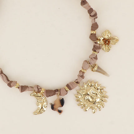 Lunéa Necklace - moon, sun, resin horn, flower