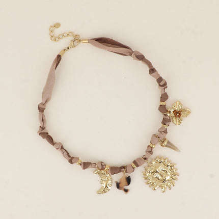 Lunéa Necklace - moon, sun, resin horn, flower