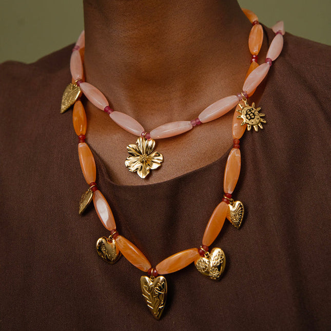 Amora necklace - on a cable, resin beads, heart-shaped flower-engraved charms