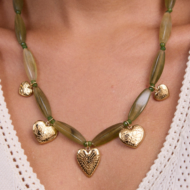 Necklace - on cable, resin beads, stainless steel rings and heart pendants with engraved flower patterns