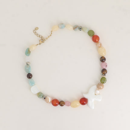 Collier - perles en pierre naturelle et oiseau en résine