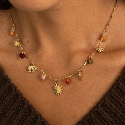 Collier - soleil, trèfle, palmier, éléphant, cœur