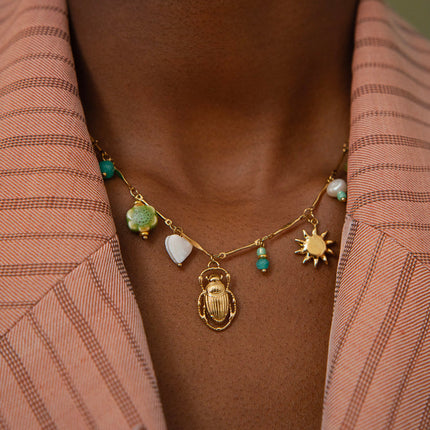 Verde Necklace - freshwater pearl, natural stones, sun, insect, enameled ceramic flower, mother-of-pearl heart