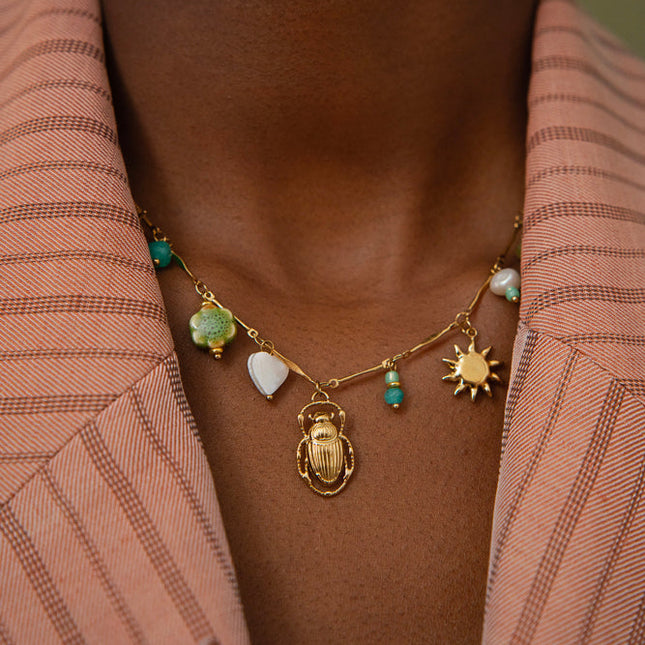 Verde Necklace - freshwater pearl, natural stones, sun, insect, enameled ceramic flower, mother-of-pearl heart