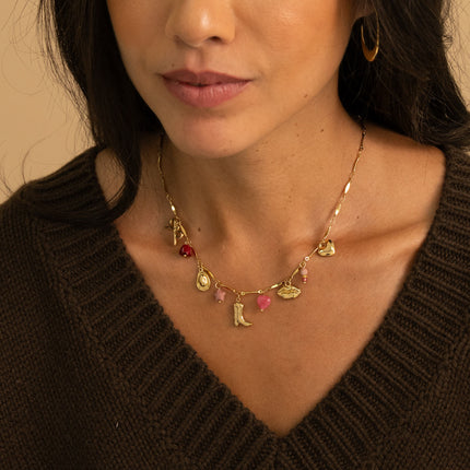 Collier - pendentifs (perles, fleur, étoile, chapeau, botte, bouche, coeur)