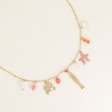 Collier - coeur et coquillage nacrés, crabe, étoile de mer émaillée, poisson, perle d'eau douce