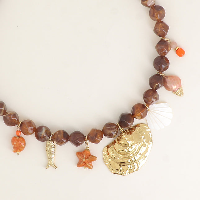 Collier sur câble - perles de résine et breloques marins