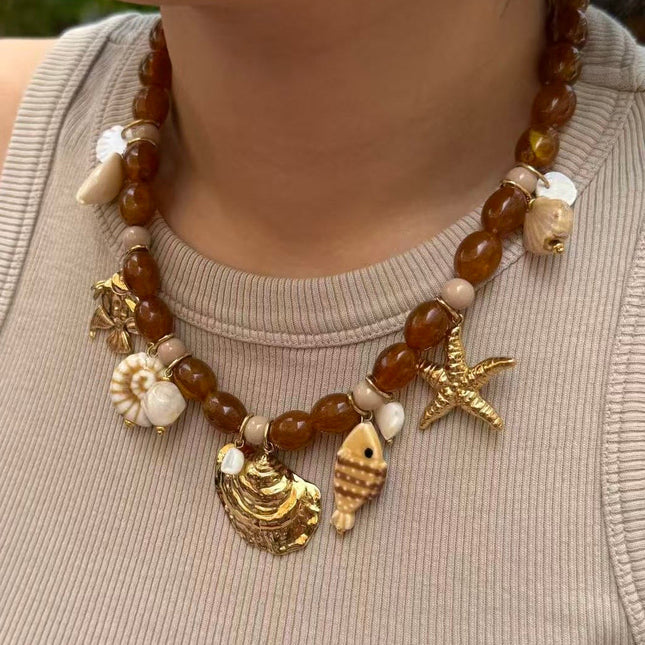 Collier sur câble - perles de résine et breloques marins, étoile de mer
