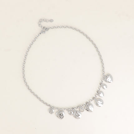Collier - pastilles rondes martelées et coeurs