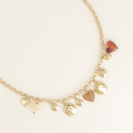 Collier - pastilles rondes martelées, coeurs et résine