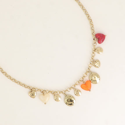 Collier - pastilles rondes martelées, coeurs et résine