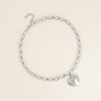 Collier - anneaux ovales alternés et pendentif coeur