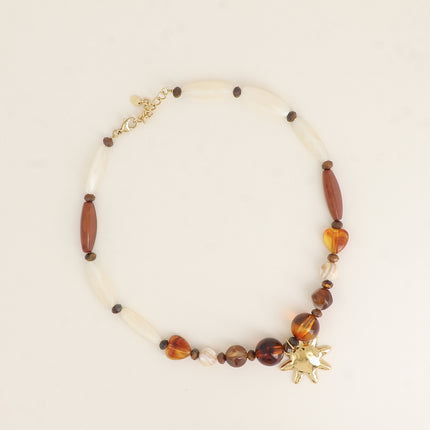 Collier - câble, perles rectangulaires en résine, soleil