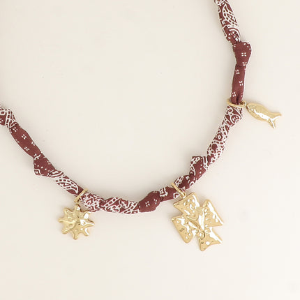 Collier - tissu ruban avec soleil, croix avec coeur et poisson
