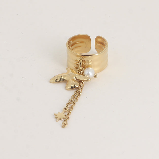 Bague pampille - oiseau, perle d'eau douce, étoile de Nord, chaînes pendantes