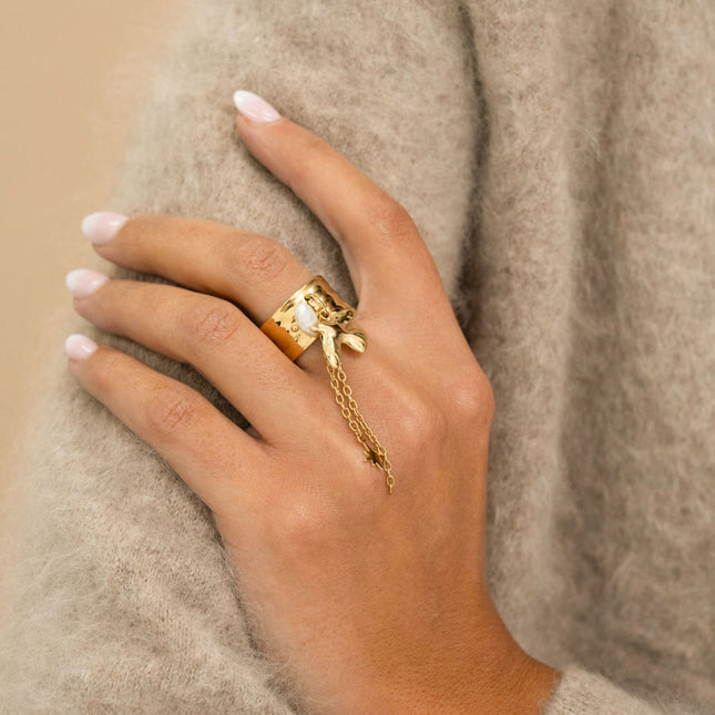 Bague pampille - oiseau, perle d'eau douce, étoile de Nord, chaînes pendantes