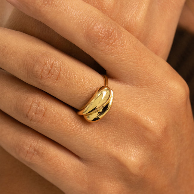 Ring - a piece of two intertwined shapes