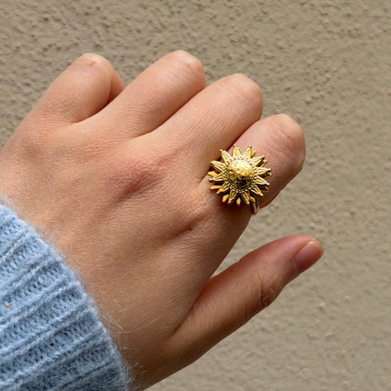 Bague rotative avec soleil texturé tournant