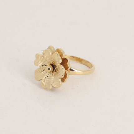 Bague rotative avec fleur texturée tournante