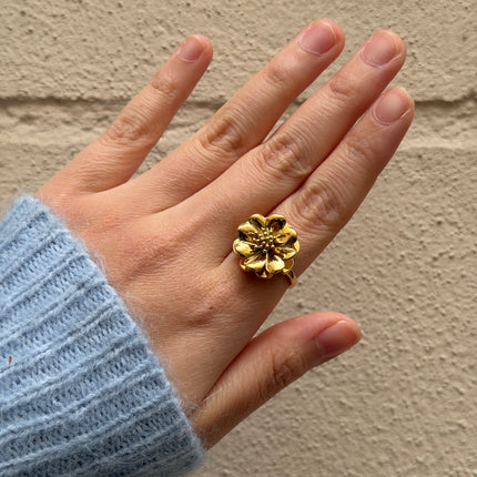 Bague rotative avec fleur tournante