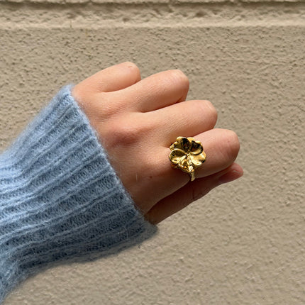 Bague rotative avec fleur hibiscus tournante