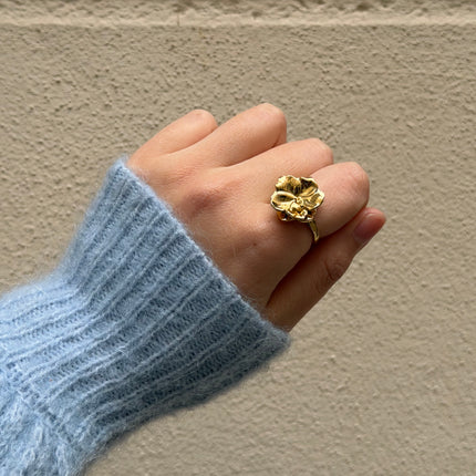 Bague rotative avec fleur hibiscus tournante