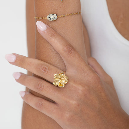 Bague rotative avec fleur hibiscus tournante